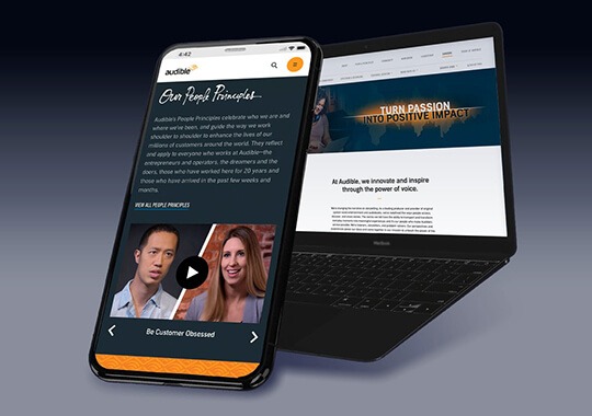 A laptop and a phone displaying a website.